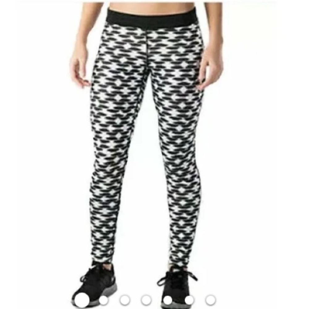 Nike Essential Dri Fit Warm
Running Tights Printed Medium poly spandex Women’s